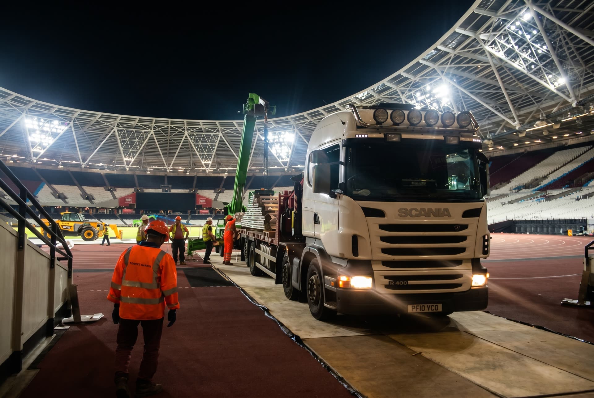 Watford Haulage Scania Hiab-equipped flatbed lorry at the London Stadium
